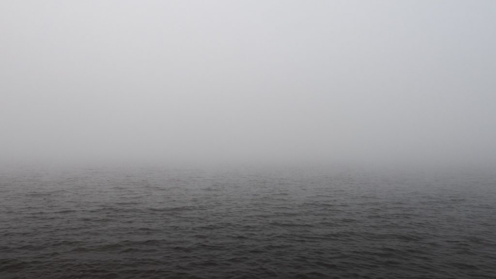 Foggy river Daugava giving the illusion of infinite space