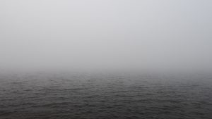 Foggy river Daugava giving the illusion of infinite space